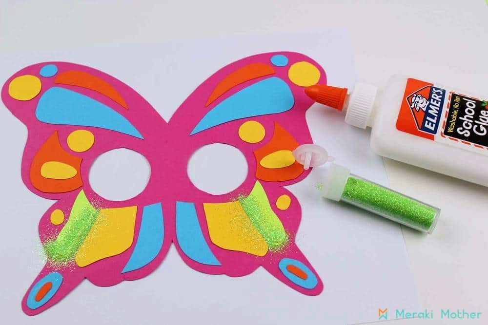 Add glitter to your butterfly mask