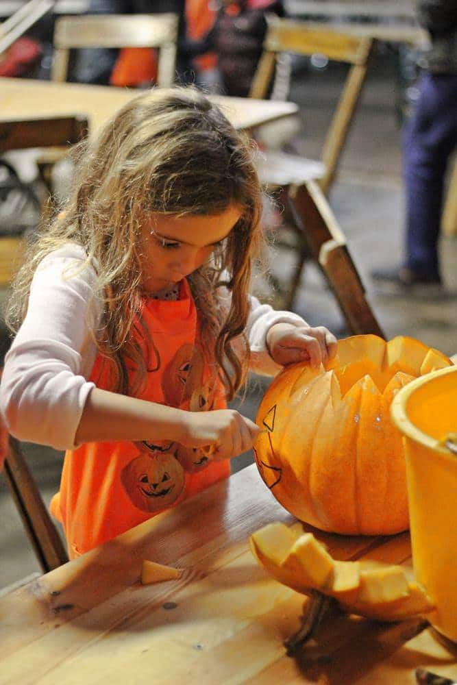 Cutting the eyes on the pumpkin