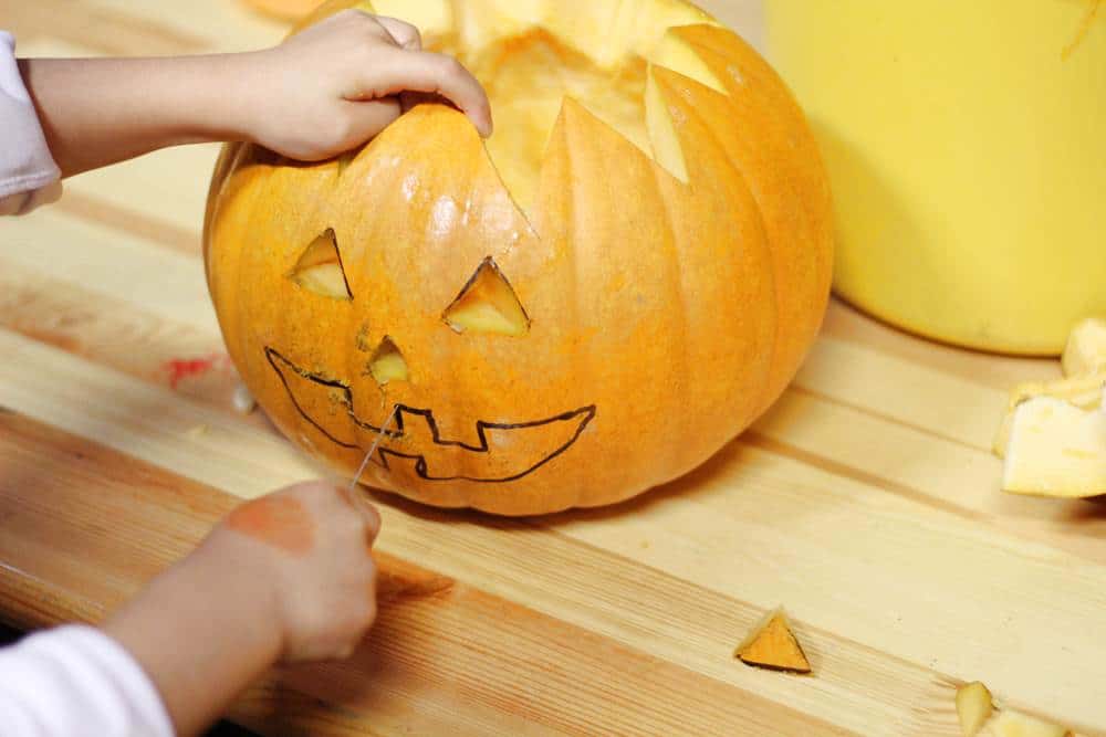 Carving pumpkin mouth