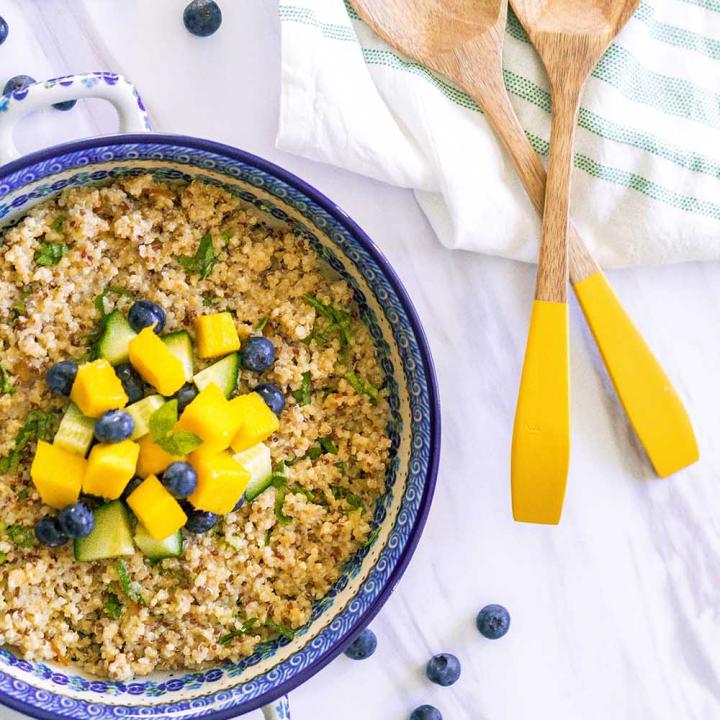 Zesty Quinoa Salad with Mangoes Blueberries and Cucumbers